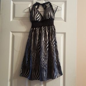 Zebra print halter dress.